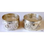 A pair of silver napkin rings