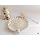 Silver scallop shell butter dish and butter knife and a silver Peugeot pepper grinder