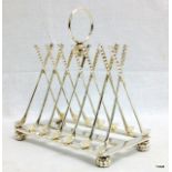 A silver plated toast rack for a golfer