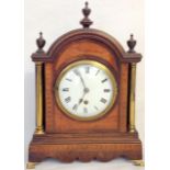 A mahogany mantle clock