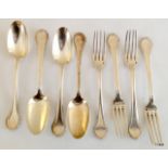 8 pieces of silver dinner spoons and forks 667gms
