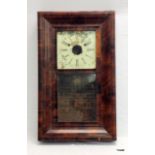 A flame mahogany American wall clock 66h x 39w x 10d