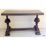 A black wood hall/sofa table on carved bulbous support and feet 79h x 132l x 58d