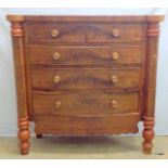 A flame mahogany chest of drawers on turned feet 2 over 3 Scotch chest 129h x 134w x 51d