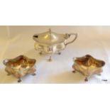 Large silver boat shape mustard pot sold with  a similar pair of open salts 145gms