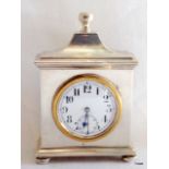 Ornate shaped silver desk clock