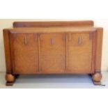 A 1930's medium oak fitted sideboard by James Philips and sons Bristol 92 x 152 x 66