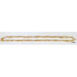 A tested 18ct gold Guard chain 120cm long 25g