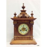 An Edwardian oak cased 14 day striking mantle clock with key, 46cm x 27cm x 16cm