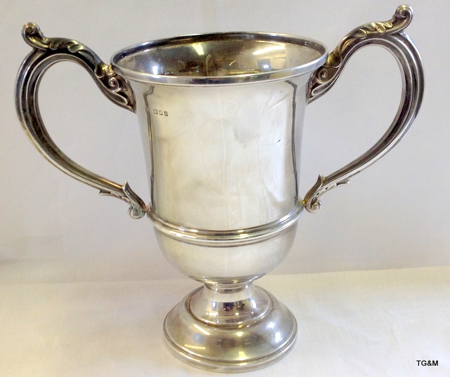 A solid silver trophy cup London 1924 13oz weight 19cm high