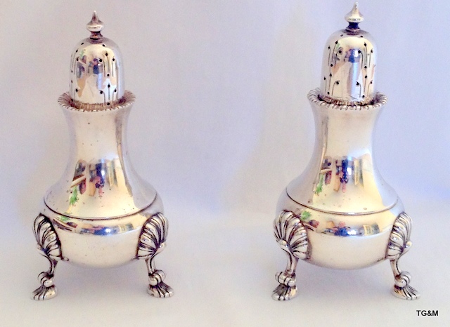 A pair of silver peppers  made for Garrard and co Regents Street London 1970