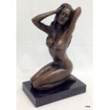 An erotic figure of a bronze lady