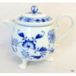 A Meissen Onion pattern lidded jug on claw feet