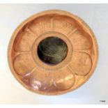 An Islamic hand beaten copper spittoon