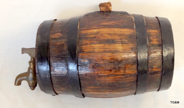 An oak brass tapped drinks barrel