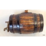 An oak brass tapped drinks barrel