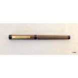 A Schaffer regency style stripe Targa fountain pen with black and gold stripes