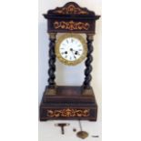 A 19th century inlay portico clock fitted a 2 train French movement with pendulum and key 45cm