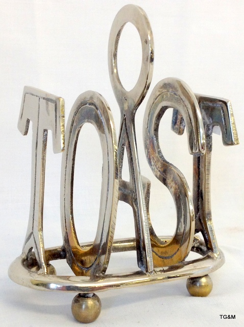 A vintage silver plated TOAST rack