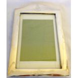 A silver picture frame with impressed military badge west riding regiment 290 x 18cm