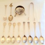 A mixed quantity of silver spoons, salt etc