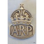 A silver hallmarked ARP badge