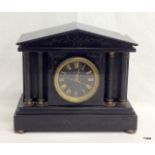 A 19th century black slate mantle clock