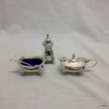 Hallmarked silver 3pc cruet with condiment spoons.