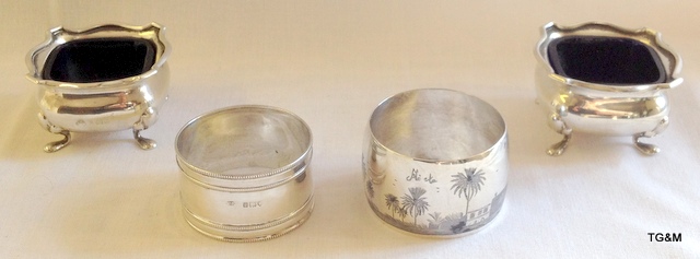 Pair of silver open salts, blue glass liner sold with 2 napkin rings 75gms