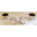 Pair of silver open salts, blue glass liner sold with 2 napkin rings 75gms