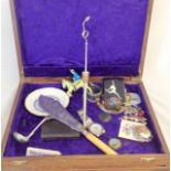 A jewellery box of curios