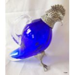 A silver plated Bristol blue decanter in the form of a bird