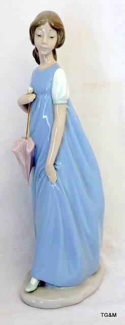 A large Nao figure, girl with umbrella
