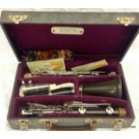 A Boosey and Hawkes Clarinet in original fitted case model 77
