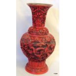 An Oriental cinnabar vase 32 cm