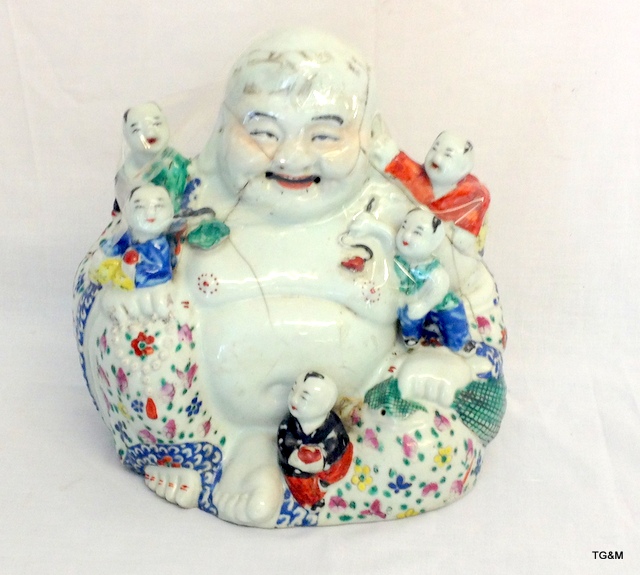 An antique ceramic happy buddha a/f 25cm high