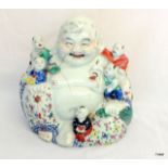 An antique ceramic happy buddha a/f 25cm high