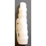 A carved Chinese White Jade carving of bamboo 10.2cm long