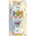 An Oriental enamelled porcelain vase with coat of arms decoration and marks to the base 25cm high