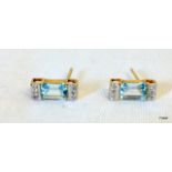 A Pair of Yellow Gold Aquamarine and Diamond Earrings