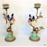 A Pair of Ceramic Bird Candlesticks