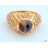 A 9ct gold men's Tiger eye ring size P