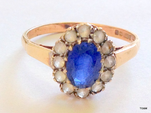 A 9ct gold sapphire and white sapphire ring, size P