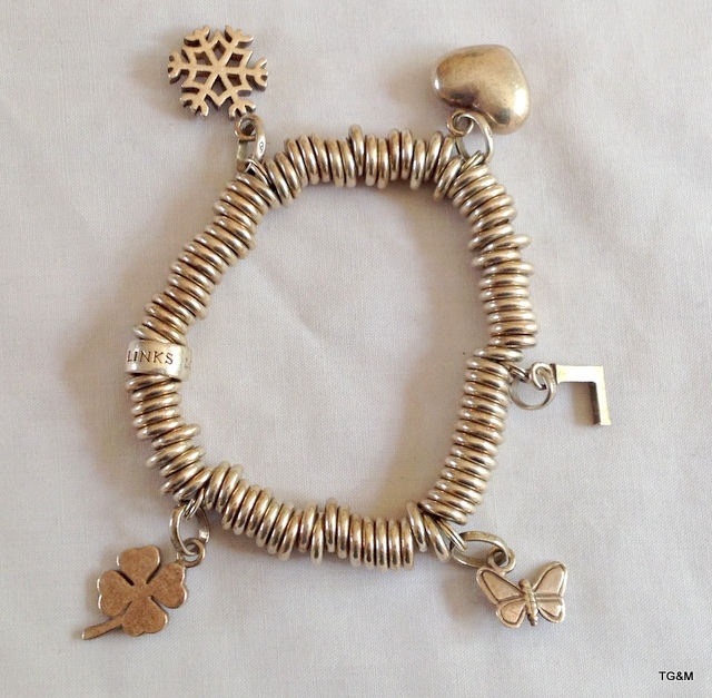 A genuine Links of London silver charm bracelet