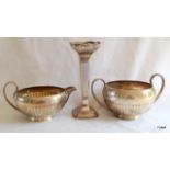 A matching silver milk jug and sugar bowl, with a silver tulip vase