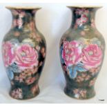 A pair of Chinese hand painted vases 31cm high