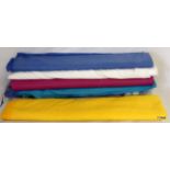 Large quantity of drape material (six rolls, various colours)