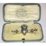 A ladies diamond and pearl brooch in the form of a crown and crescent approx 2ct diamond in old cut