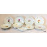 A hand painted continental part dinner service  18 pieces including plate, tureen and bowl in a