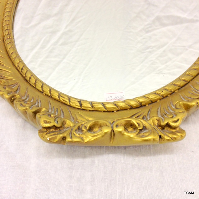 A gilt framed oval wall hanging mirror. 44 x 34cm - Image 4 of 6